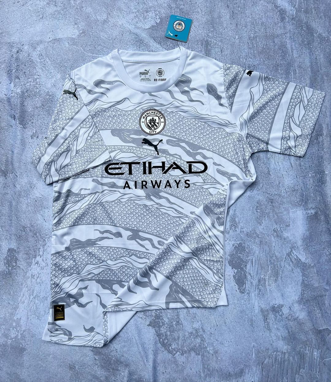 Camisa Manchester City Ano Do Dragão 24/25 - Oliver Company