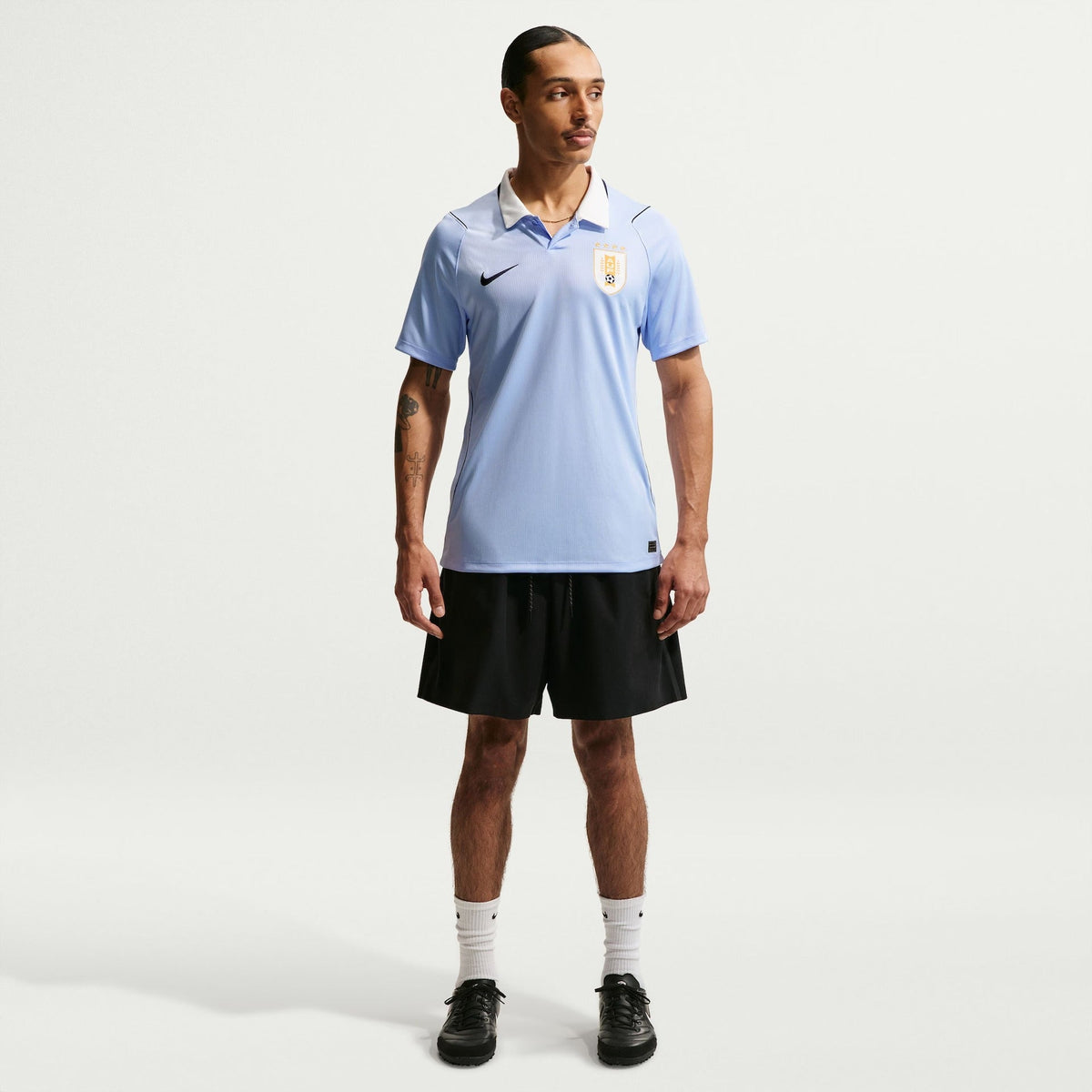 Camisa Uruguai I 2026/27 Azul-Celeste Torcedor - detalhes de acabamento 1
